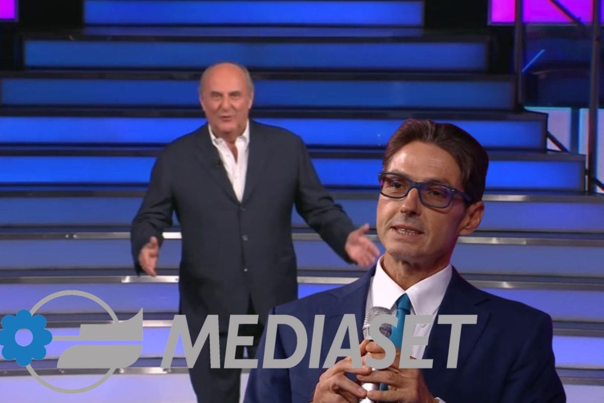 gerry scotti, pier silvio berlusconi e logo mediaset